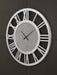 Reinport Wall Clock - Faith Furniture (Manhattan, KS)