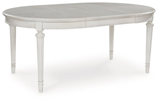 Montelaine Dining Extension Table - Faith Furniture (Manhattan, KS)