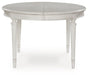 Montelaine Dining Extension Table - Faith Furniture (Manhattan, KS)