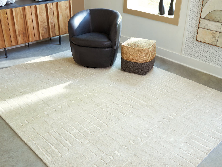 Wolbert 7'8" x 10' Area Rug - Faith Furniture (Manhattan, KS)