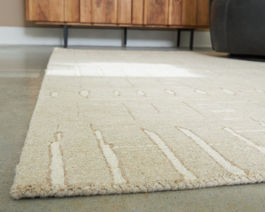 Wolbert 5' x 7' Area Rug - Faith Furniture (Manhattan, KS)