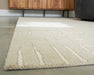 Wolbert 5' x 7' Area Rug - Faith Furniture (Manhattan, KS)