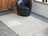 Wolbert 5' x 7' Area Rug - Faith Furniture (Manhattan, KS)