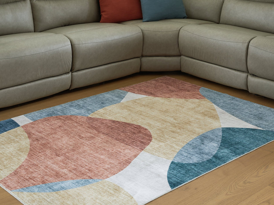 Chanleigh Washable 5' x 7' Area Rug - Faith Furniture (Manhattan, KS)