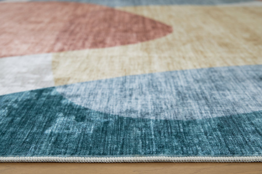 Chanleigh Washable 5' x 7' Area Rug - Faith Furniture (Manhattan, KS)