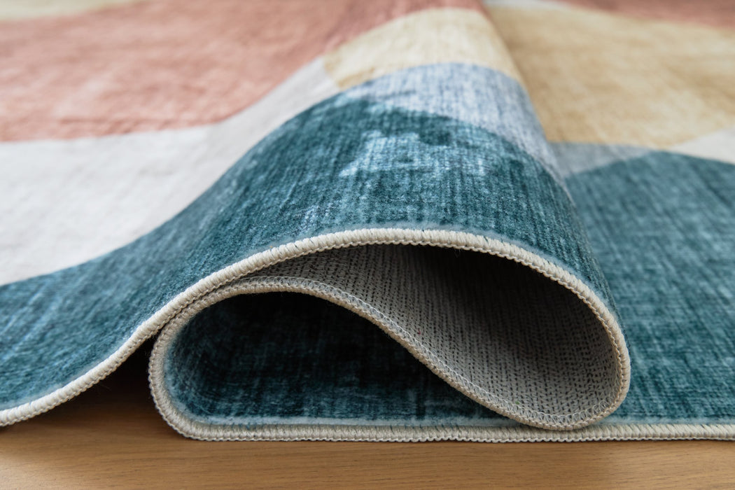 Chanleigh Washable 5' x 7' Area Rug - Faith Furniture (Manhattan, KS)